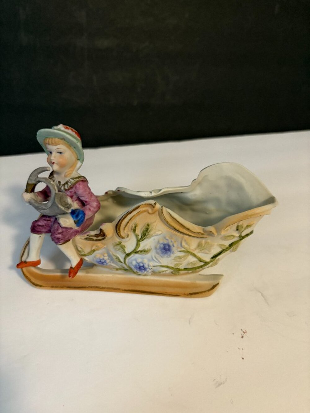 Vintage Boy on Sleigh Figurine or Flowerpot